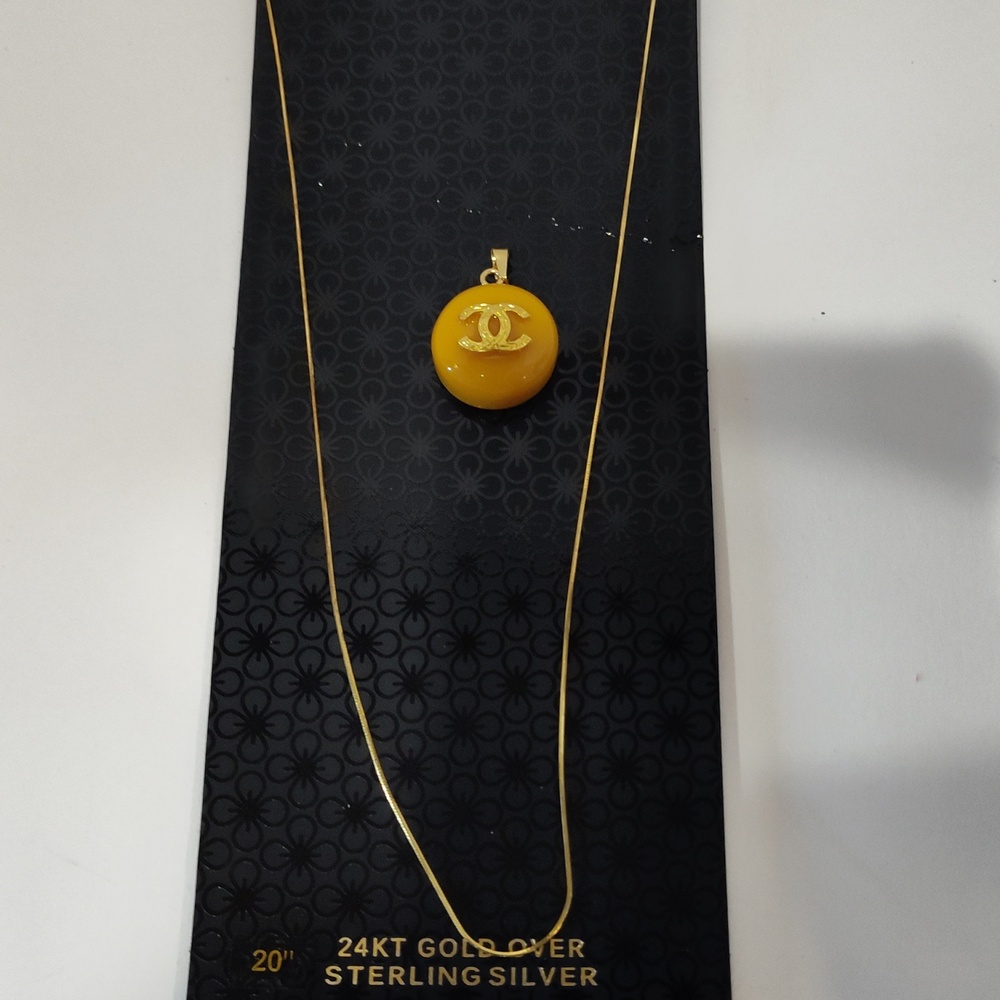 CC  Gold Zipper Pull